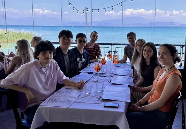 Lab members at lunch by a lake, 2025